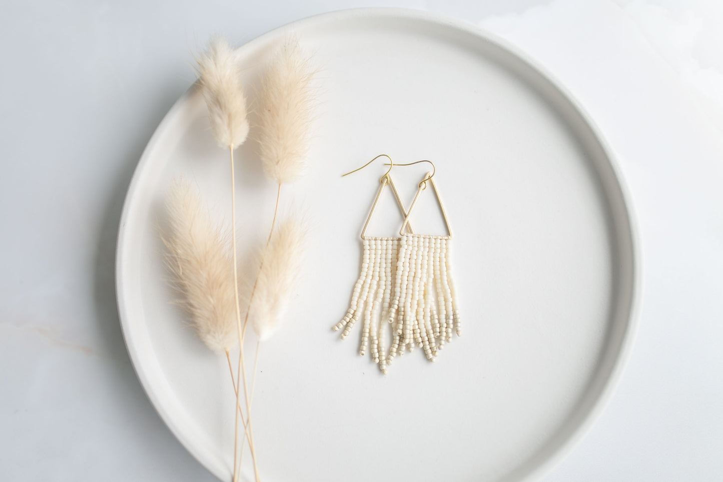 Beaded earring | ivory fringe | spring collection