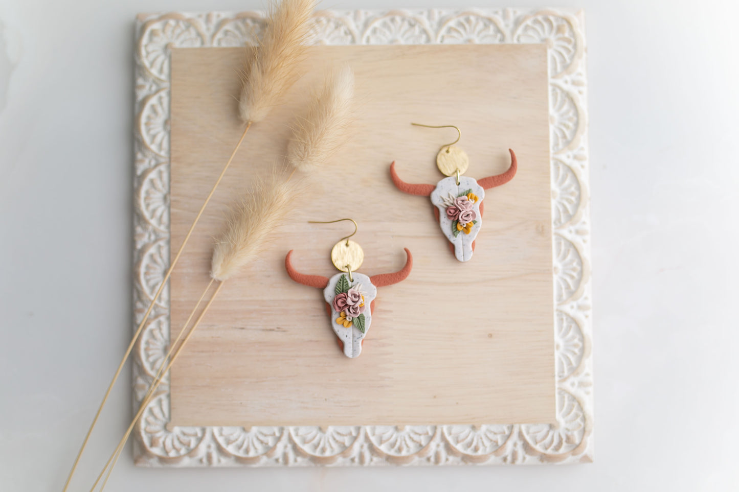 Clay earring |tera-cotta floral longhorns | Southwest Collection