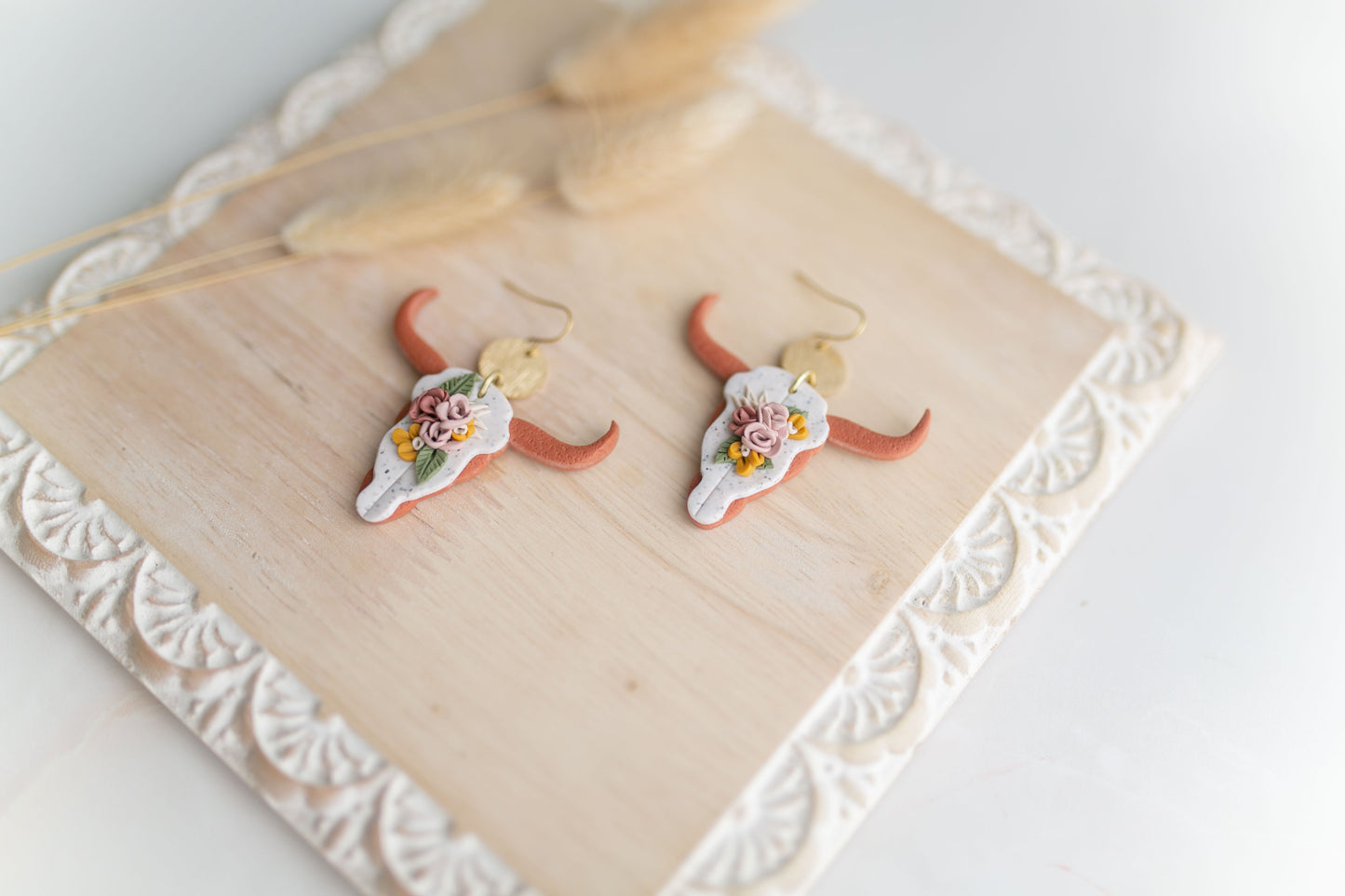 Clay earring |tera-cotta floral longhorns | Southwest Collection