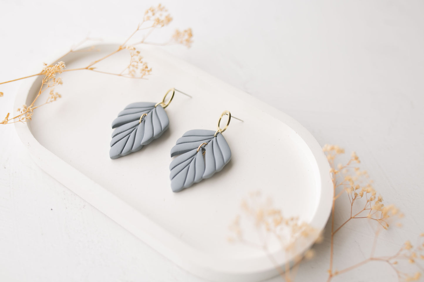 Clay earrings | dusty blue leaves
