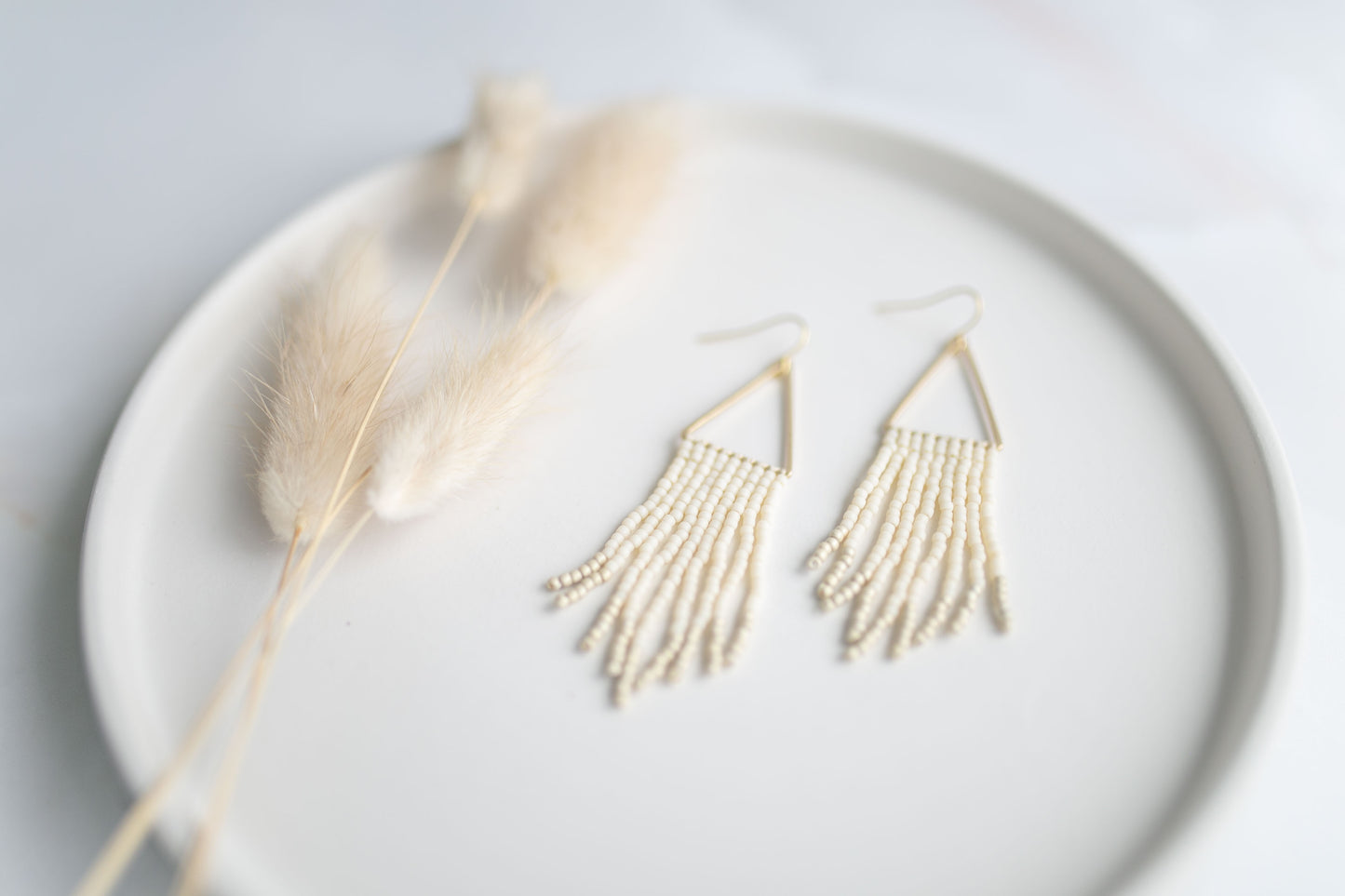 Beaded earring | ivory fringe | spring collection