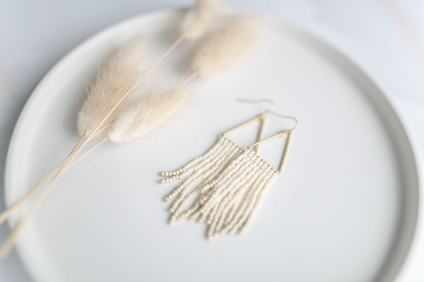 Beaded earring | ivory fringe | spring collection