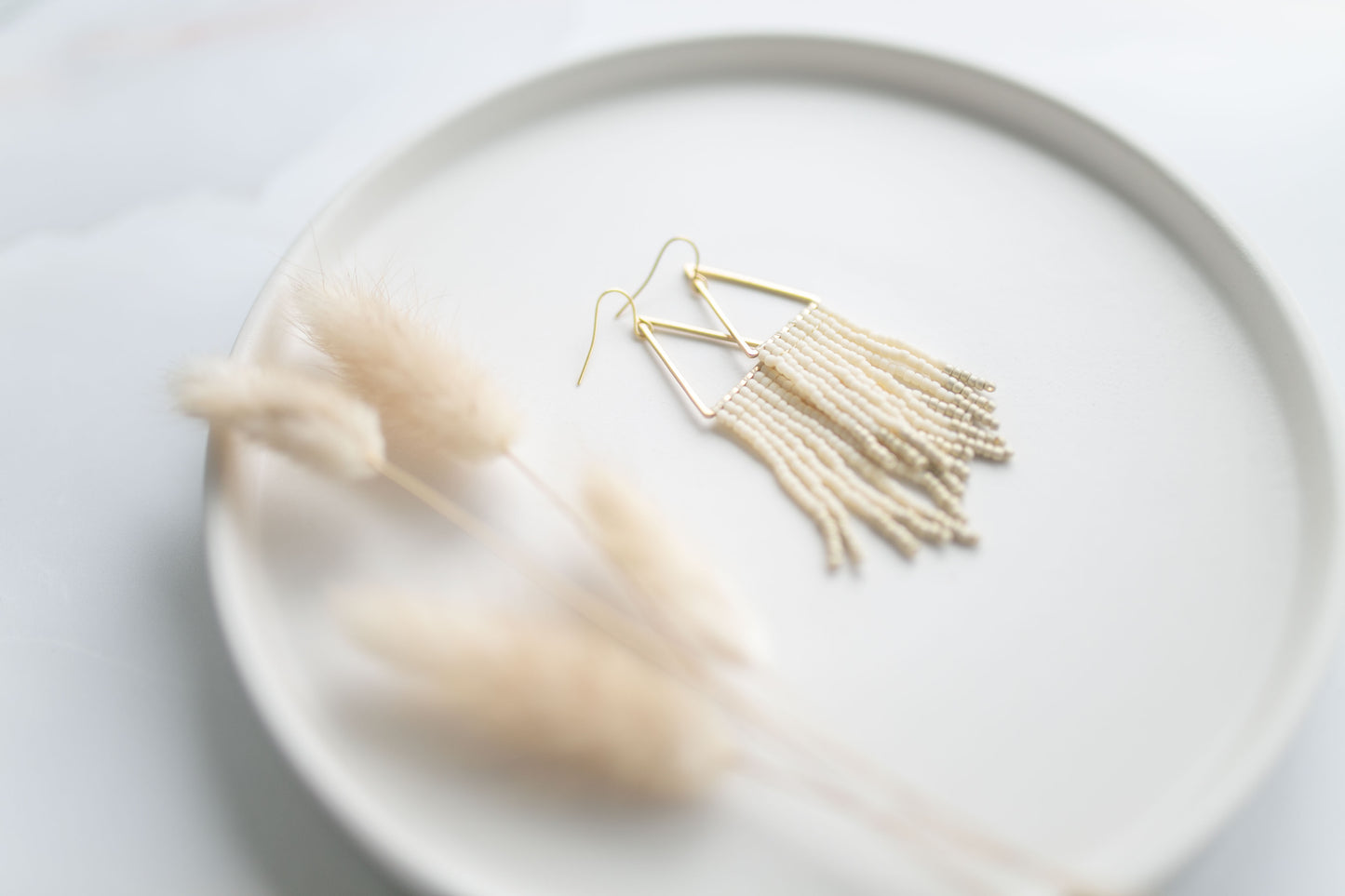 Beaded earring | ivory fringe | spring collection